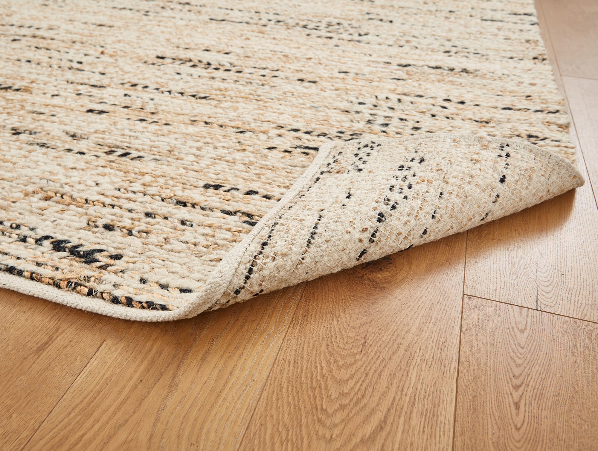 Coyuchi + Rejuvenation Kaden Braided Flatweave Wool Jute Rug